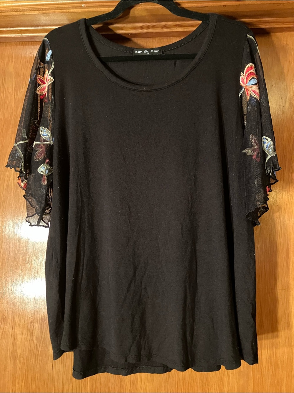 Kim & Cami Black Top with Embroidered Sheer Floral Sleeves